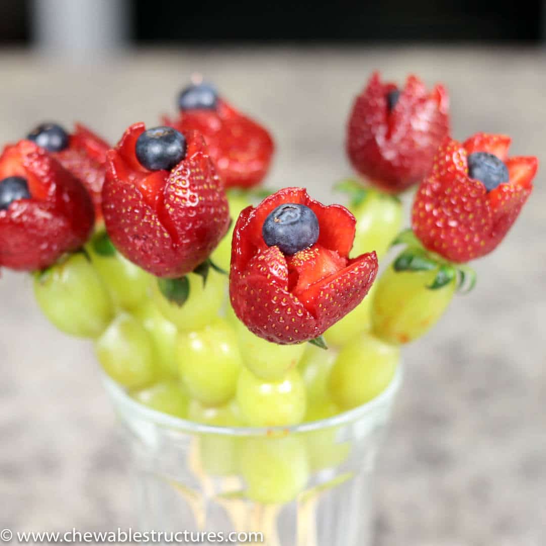 strawberry roses with green grape stems