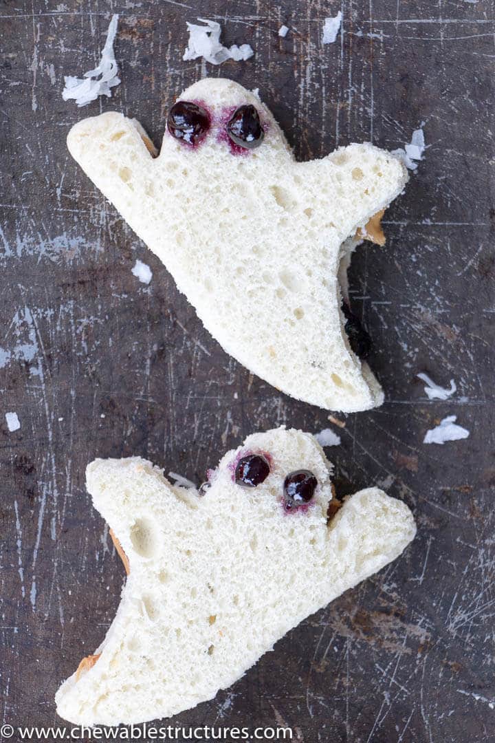 ghost-shaped Halloween sandwiches made of peanut butter and jelly 