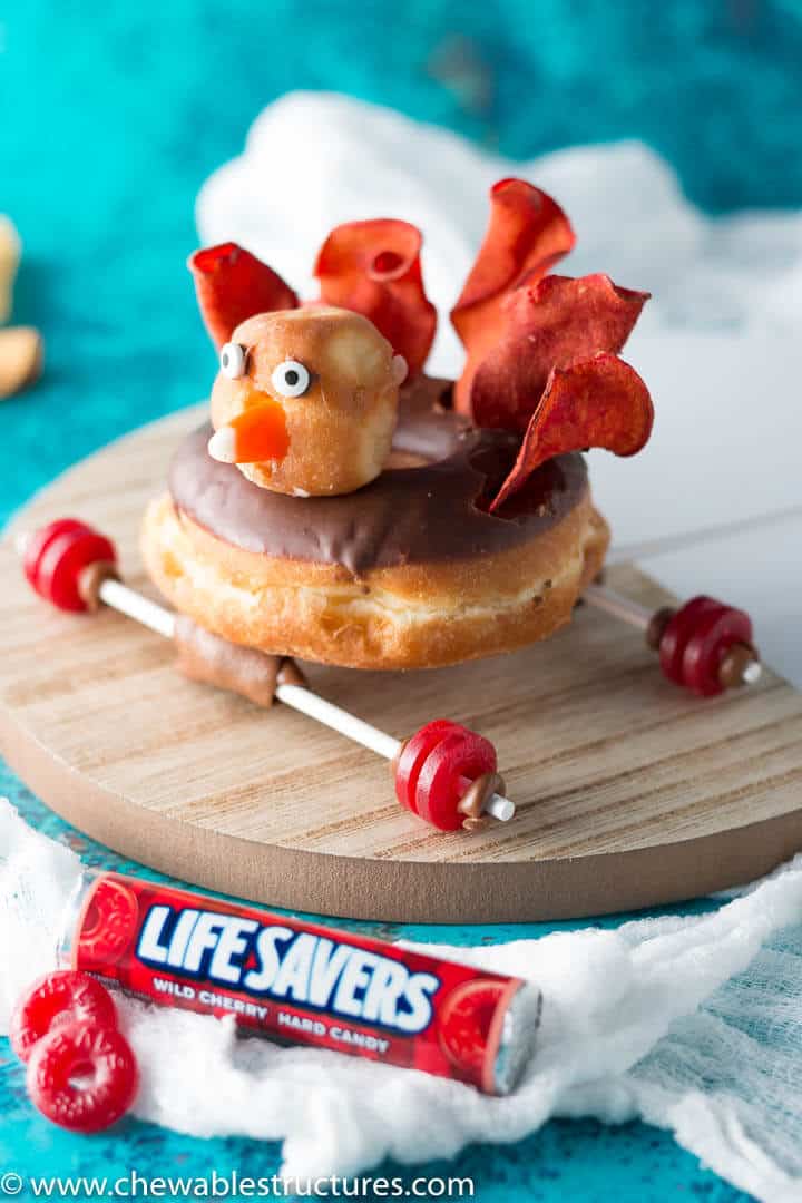 Thanksgiving Treats using chocolate turkey donut on a car frame with Life Savers tires